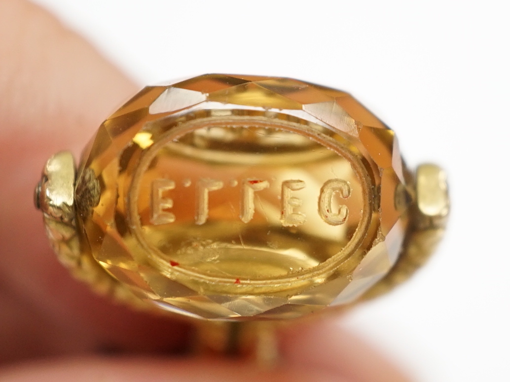 A Victorian yellow metal overlaid and swivelling citrine set watch key, 49mm.